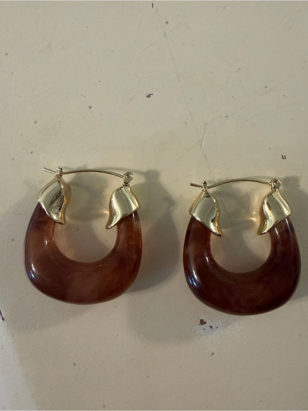 Urban Outfitters Brown Hoop Earrings with Gold Leaf Accents